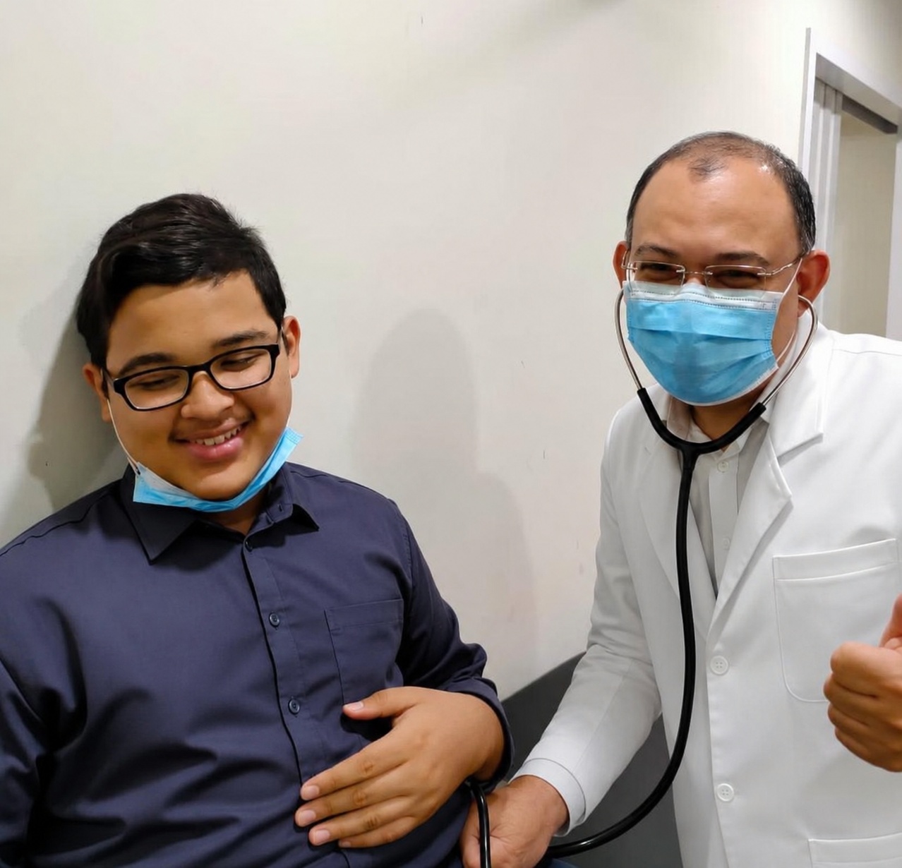 Dr Nazim with patient