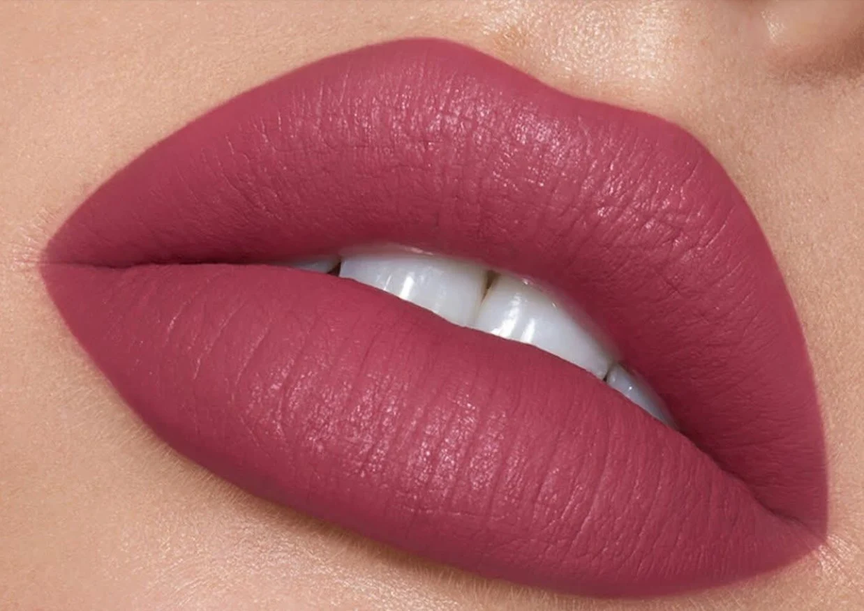 Sierra Rae — cinematic macro close-up of lips in deep cherry velvet matte