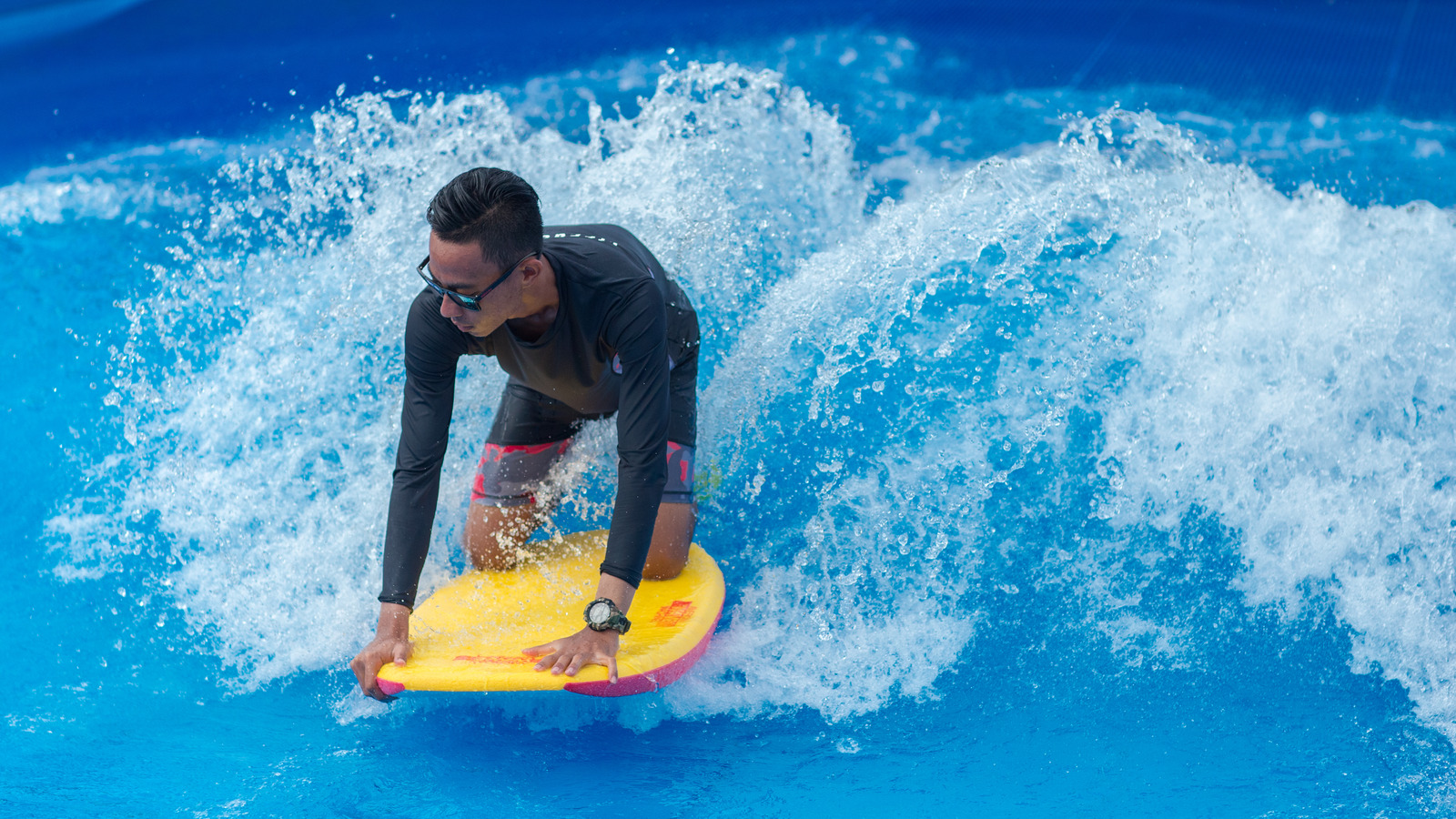 Guest surfing a wave